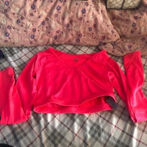 long sleeve neon pink crop top, worn about 9 or 10 times in good condition